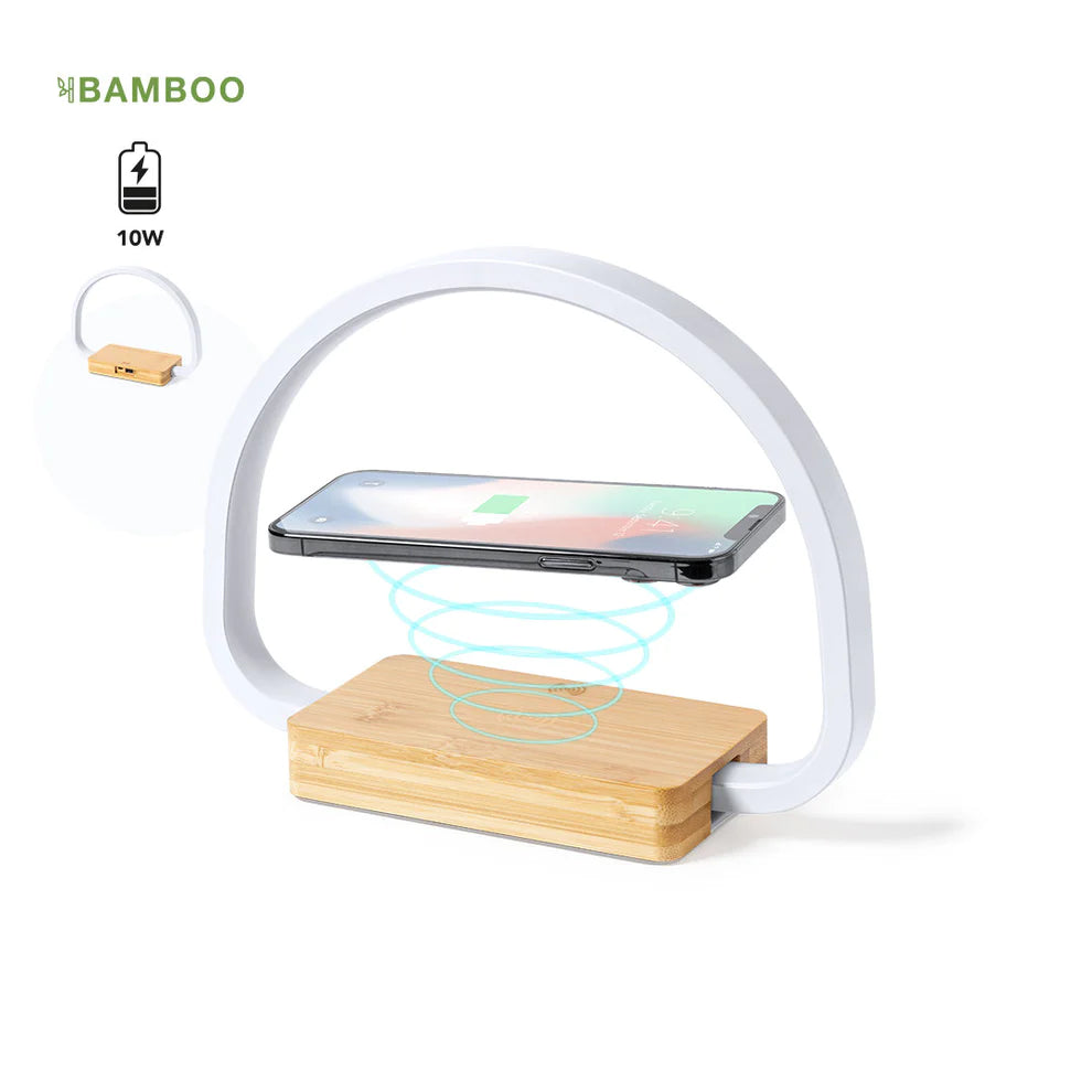 Lampe chargeur fabriqué en bambou de coupes naturelles et avec une base antidérapante. Chargeur sans fil 10W intégré. Il comprend 52 LED et 3 positions d'éclairage (chaud, froid et moyen), avec une intensité lumineuse réglable.
