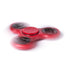 Fidget spinner rouge en pleine rotation