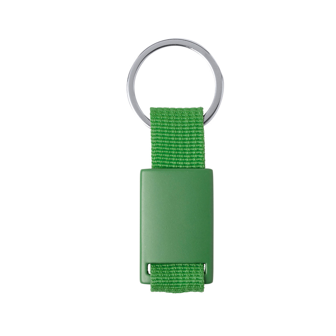 Porte-clés personnalisable avec plaque métallique et ruban robuste, présenté dans un emballage soigné