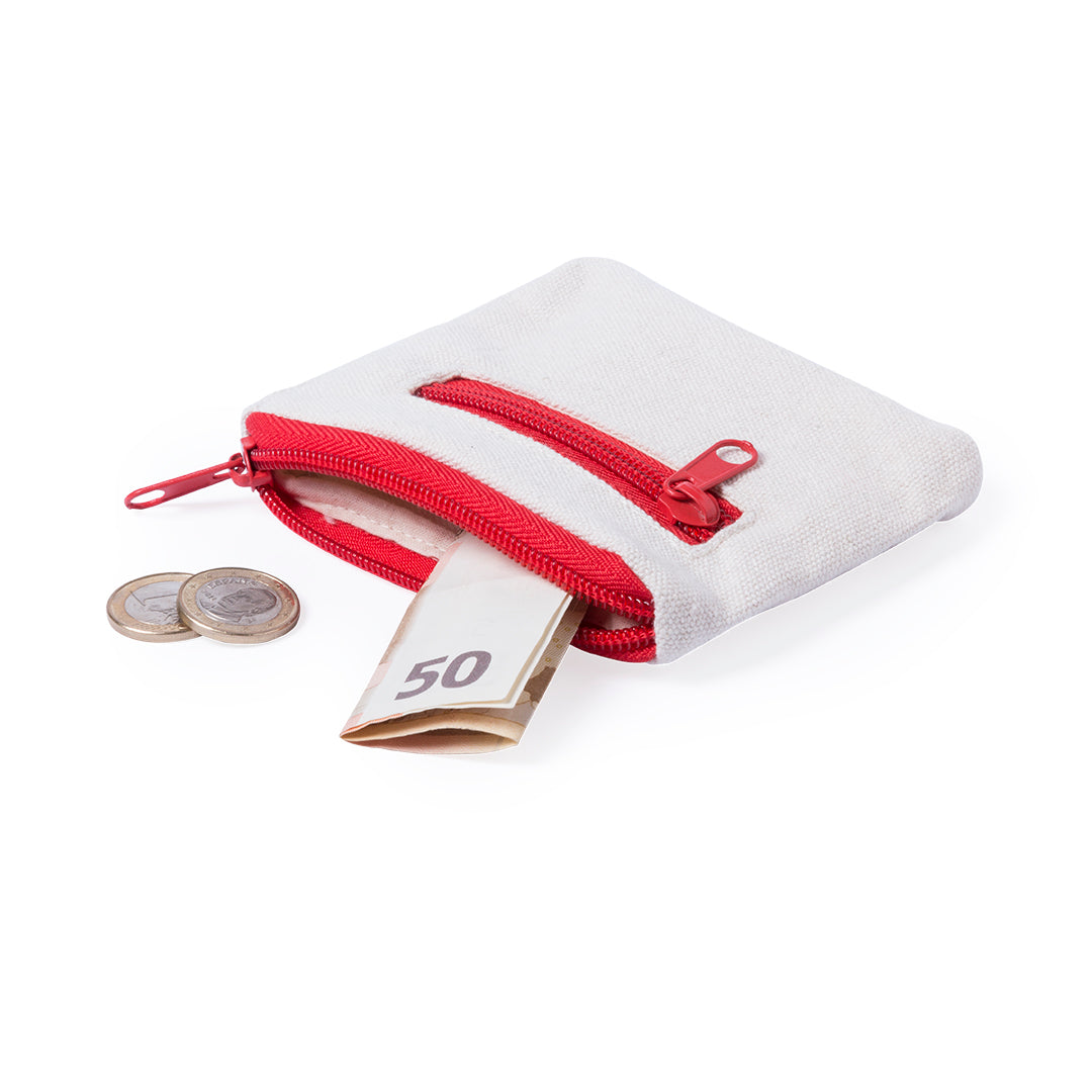 Porte monnaie bicolore en coton, avec le corps blanc et fermetures zippées rouges. De l'argent sort du porte monnaie.