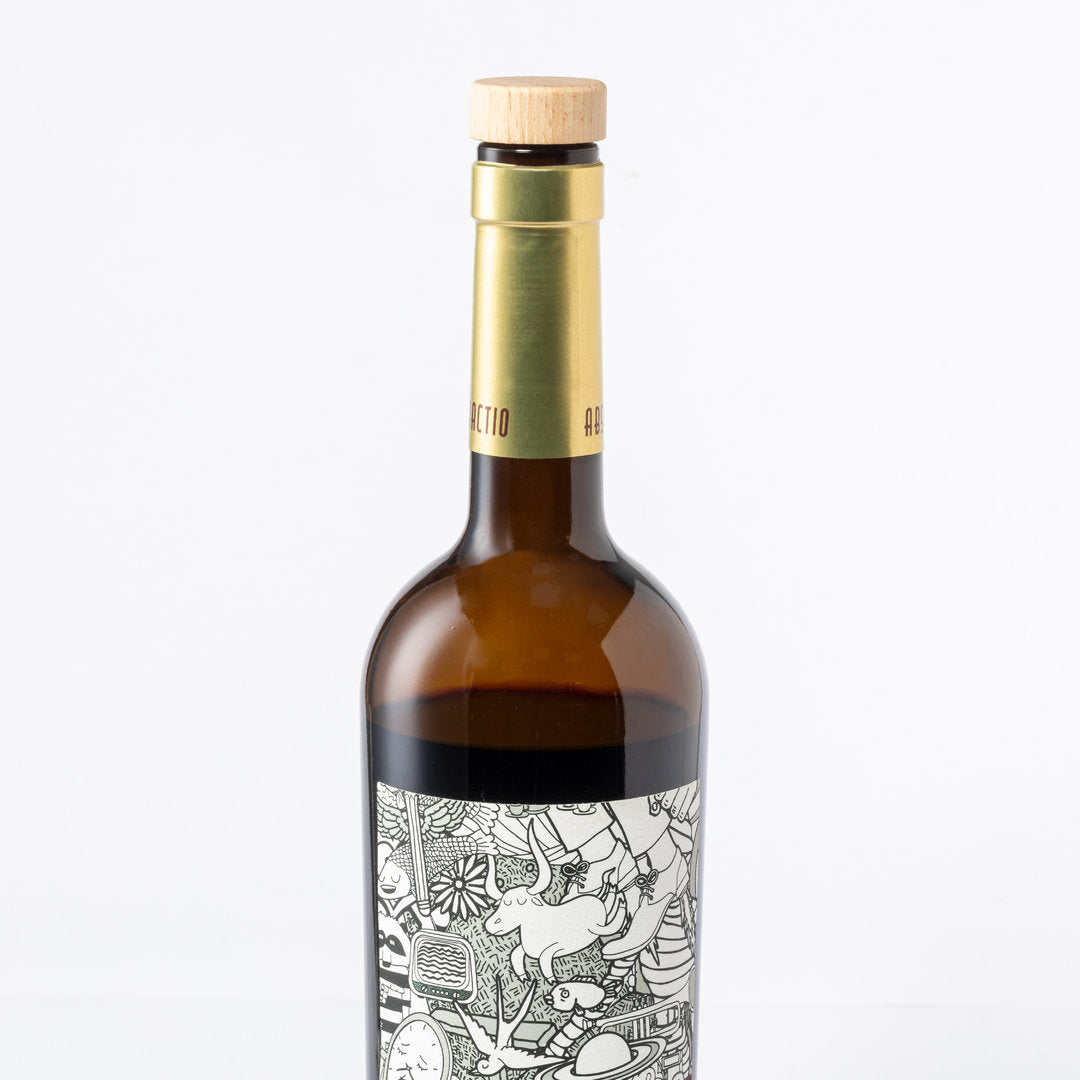 Bouchon de bouteille réutilisable, avec un dessus en bois naturel et un fond hermétique.