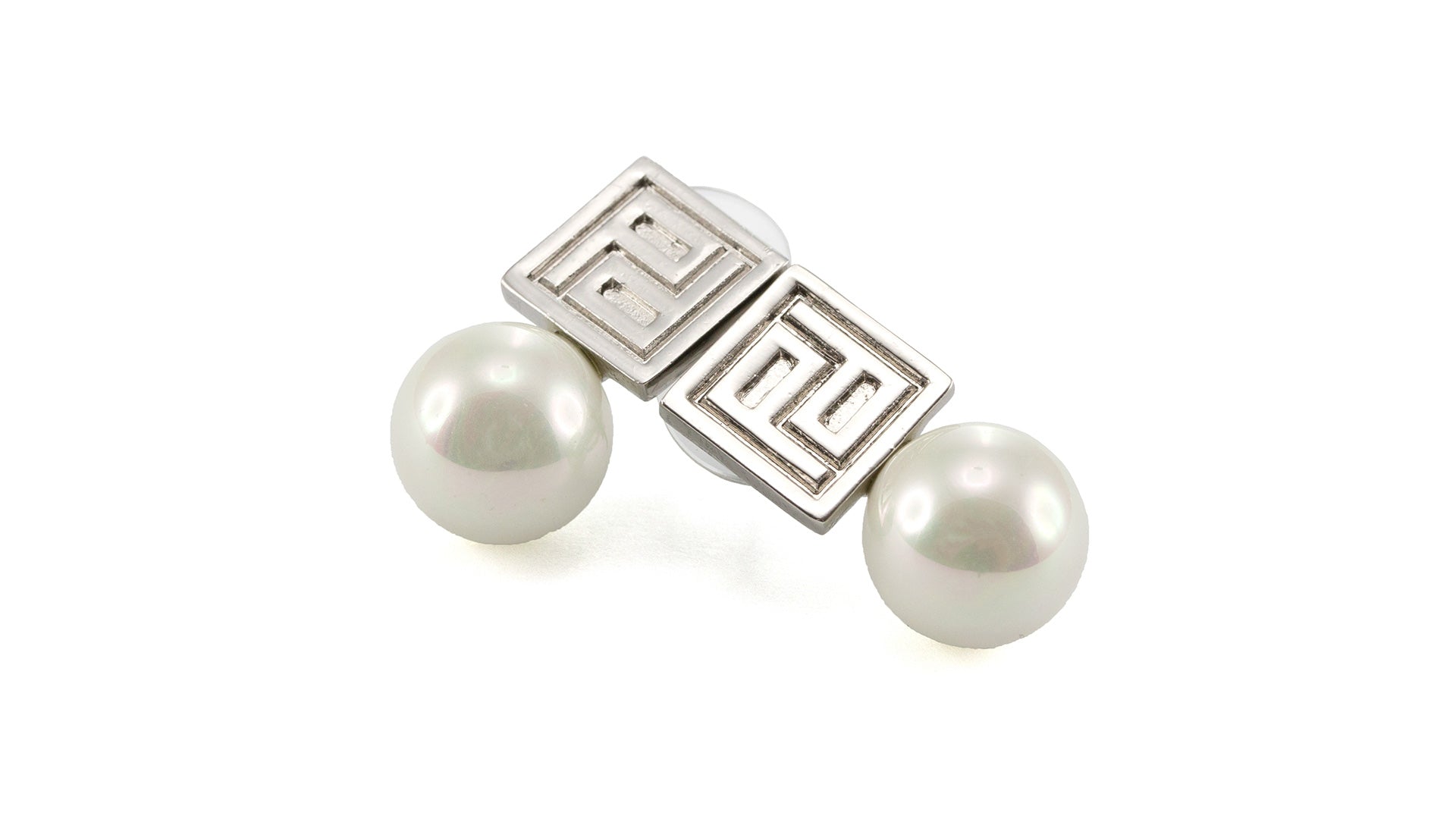 Élégantes boucles d'oreilles Pertegaz : métal laqué finition argent, perles de verre, livrées avec un sac et un étui en similicuir.