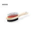 Brosse double-face pour animaux avec manche en bois naturel.