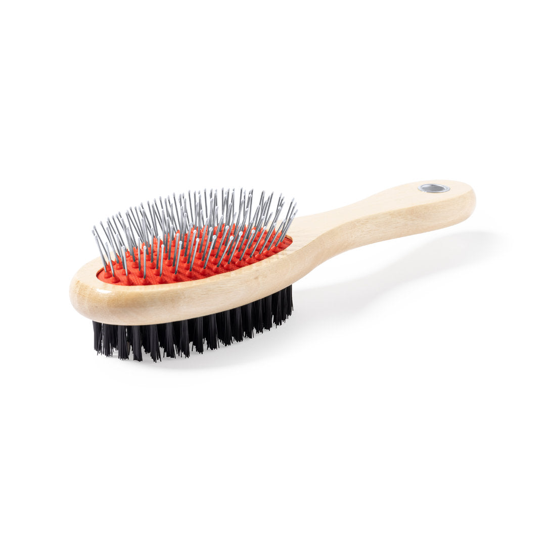 Brosse à double face pour animaux avec manche en bois.