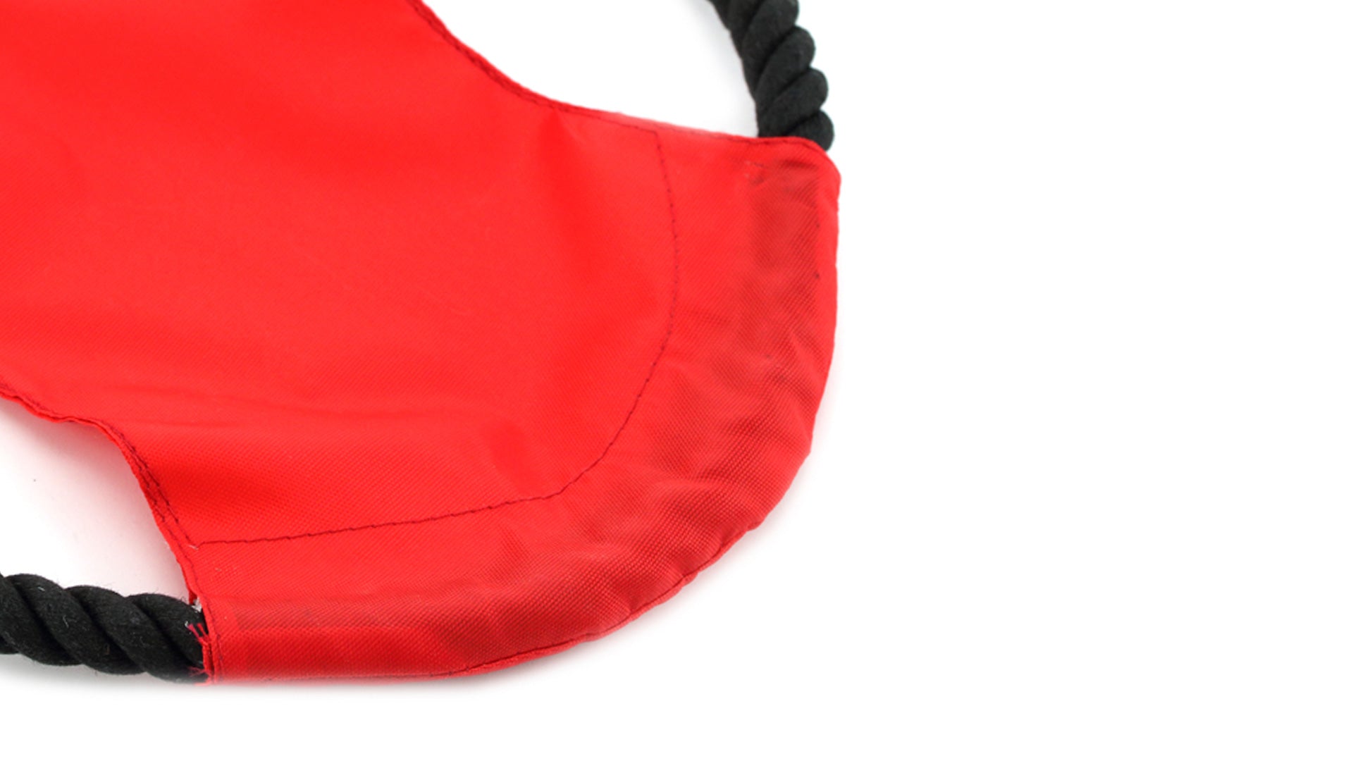 Frisbee pour animaux avec corde solide en coton et partie centrale en polyester.