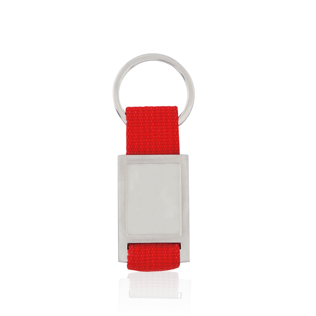 Porte-clés en métal avec ruban en polyester coloré. Personnalisable avec marquage Doming.
