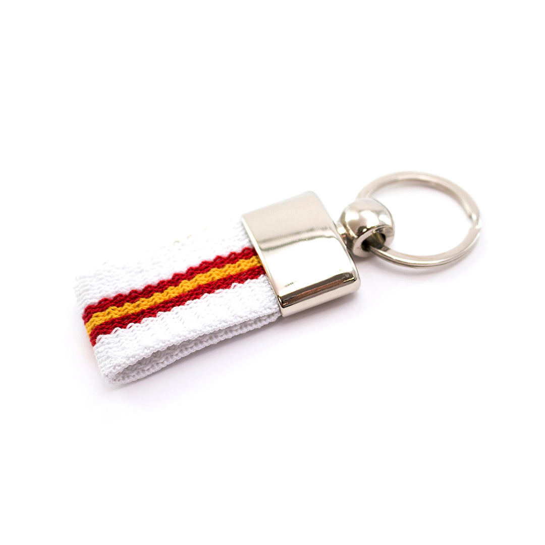 Porte-clés en métal et polyester avec drapeau espagnol, finition argentée.