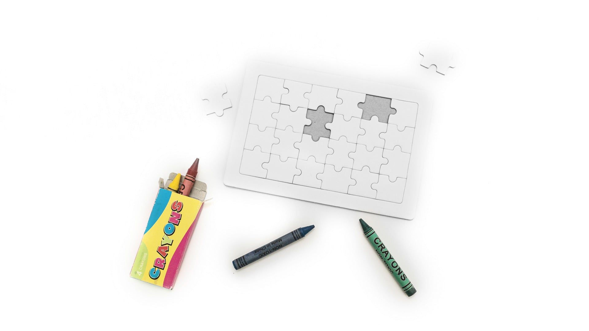 Activité créative pour enfants : puzzle blanc de 24 pièces avec set de crayons cire.