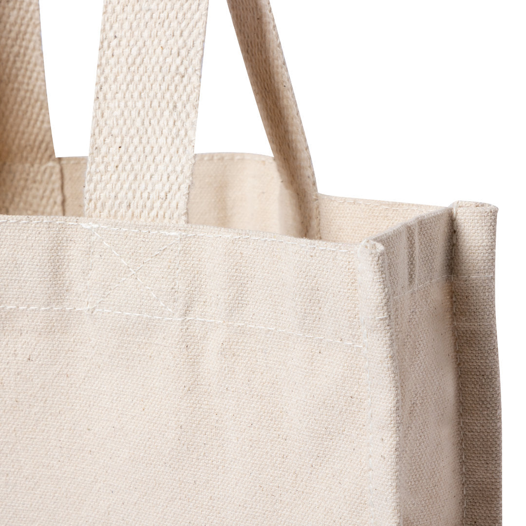 sac en toile Conception en 100% coton, soulignant un engagement envers les matériaux naturels et écologiques.