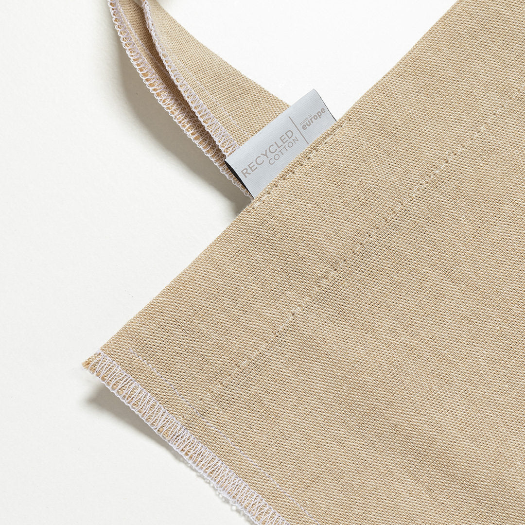 totebag Poignées longues de 70 cm avec finition cousue, pour une résistance jusqu'à 9 kg.