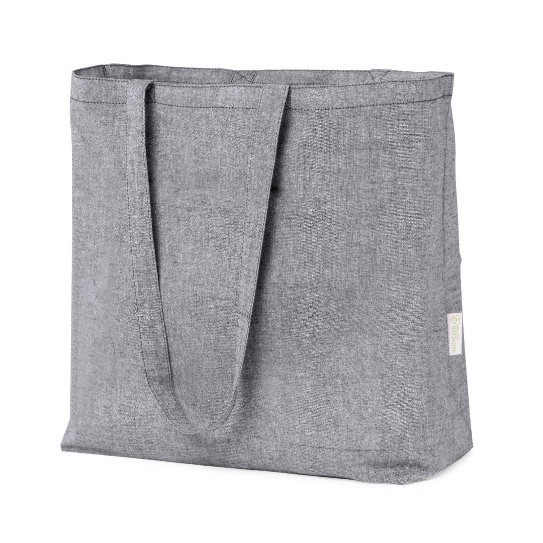 Comprend des anses longues et renforcées de 70 x 2,5 cm pour une prise confortable