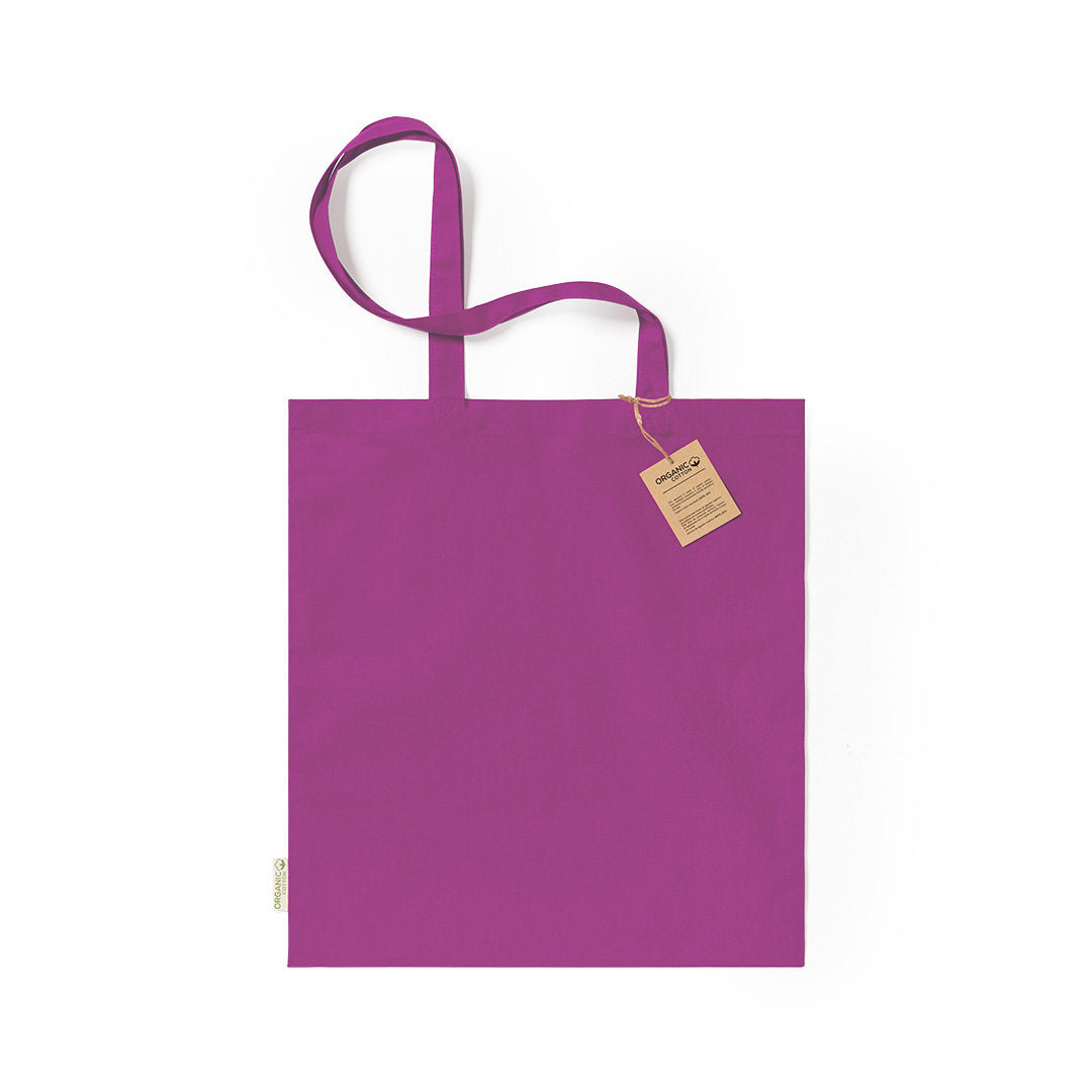 tote bag Étiquette suspendue en carton recyclé, soulignant l'engagement envers la durabilité.