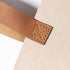 sac feutrine avec Matériau éco-tendance, soulignant l'engagement envers la durabilité et le recyclage.