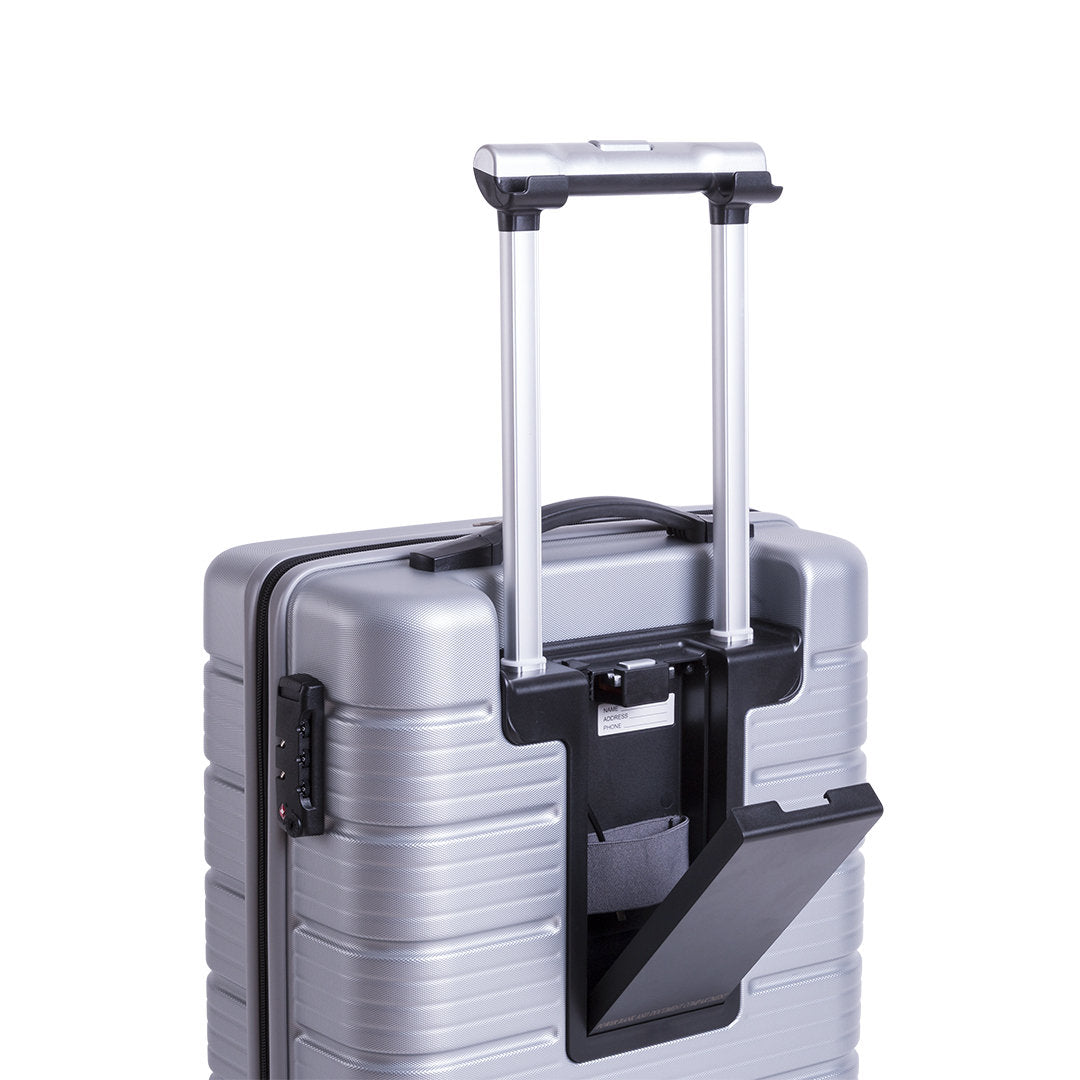 valise avec Double poignée rabattable équipée d'un support de tablette intégré pour une utilisation pratique.